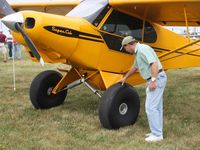 N46LF @ OSH - Are these tires or floats or both?  Airventure 2009 - Oshkosh, Wisconsin