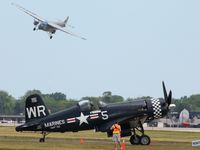 N179PT @ OSH - N8407 in the background at Airventure 2009 - Oshkosh, Wisconsin - by Bob Simmermon