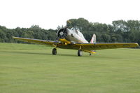 G-AZBN @ EGTH - 3. FT391 T-6 Harvard departing the Shuttleworth Military Pagent air Display Aug 09