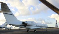N225CX @ TNCM - park at the private  ramp - by daniel jef