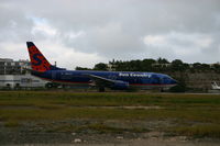 N807SY @ TNCM - powering up fro take  off - by daniel jef