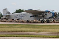 N8407 @ OSH - Landing RWY 18 at Airventure 2009 - Oshkosh, Wisconsin - by Bob Simmermon