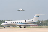 N780E @ KDPA - International Business Machines (IBM) GULFSTREAM AEROSPACE G-IV, N780E, on the ramp at KDPA. - by Mark Kalfas