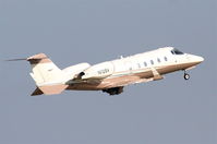 N128V @ KDPA - learjet 60, N128V off of 20R KDPA for KCVX - by Mark Kalfas