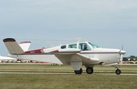 N4577V @ KOSH - Beech 35 - by Mark Pasqualino