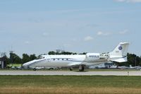 N103LS @ KOSH - Learjet 60 - by Mark Pasqualino