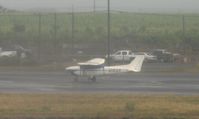 N191AR @ PHOG - Sorry for the awful quality. Rain + Landing Airplane = Bumpy ;) - by Kreg Anderson