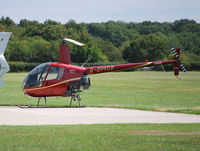 G-DMCD @ EGLD - Robinson R22 Beta at Denham - by moxy