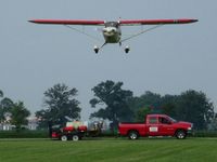 N4122M @ I80 - Landing RWY 9 at the EAA fly-in - Noblesville, Indiana - by Bob Simmermon