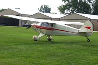 N4122M @ I80 - Textbook wheel landing on RWY 9 at the EAA fly-in - Noblesville, Indiana - by Bob Simmermon