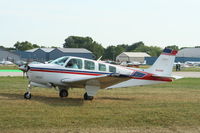 N333RE @ KOSH - Beech A36 - by Mark Pasqualino
