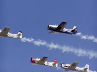 N289RD @ KOSH - Flight of T28's - by dmagee