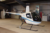 G-JSAK @ EGKH - Robinson R22 at Headcorn , Kent , UK - by Terry Fletcher
