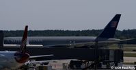 N771UA @ IAD - Sneaking in to the terminal