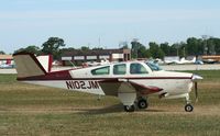 N102JM @ KOSH - Beech V35B