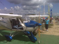 N146RC @ KOSH - Photo of Cheetah at eaa airventure 2009 - by Jon Syvertson