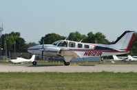 N8121R @ KOSH - Beech 58