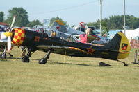 N122FS @ KOSH - YAK-52TW