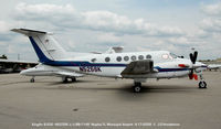 N525SK @ APF - cloudy day in Naples - by J.G. Handelman