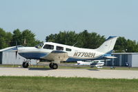 N7702H @ KOSH - Piper PA-28-181 - by Mark Pasqualino