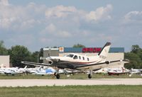 N700AP @ KOSH - Socata TBM 700 - by Mark Pasqualino
