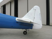N6411D @ CMA - 1942 North American SNJ-4, P&W R1340 600 Hp, in reconstruction, tail - by Doug Robertson