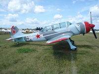 N152TD @ KOSH - YAK-52TD - by Mark Pasqualino