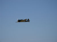 N712Z @ CMA - 1942 Mitsubishi A6M-3 ZERO SEN 'Zeke' Model 22, P&W R-1830 for original Nakajima NK1F Sakae 21 radial of 1,130 Hp, air show fly by. - by Doug Robertson