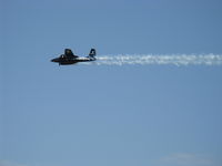 N909TC @ CMA - 1945 Grumman F7F-3 TIGERCAT, two P&W R2800-34 Double Wasps 2,100 Hp each, airshow fly by with smoke - by Doug Robertson
