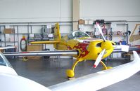 D-EXFT @ EDKB - Extra EA-200 in a maintenance hangar during the Bonn-Hangelar centennial jubilee airshow