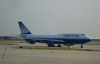 N119UA @ KORD - Boeing 747-400 - by Mark Pasqualino
