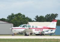 N567EB @ KOSH - Beech A36 - by Mark Pasqualino