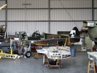 N749DP @ CMA - 1983 Vickers/Supermarine SPITFIRE Mark XIVe, Rolls Royce Griffon 65 V-12, 2,050 Hp, in restoration - by Doug Robertson