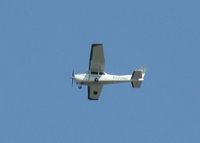 N520ND @ KAXN - Flying downwind for runway 13 - by Kreg Anderson