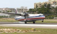 N355AT @ TNCM - landing on runway 10 from tjsj