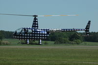 SE-JHS @ ESOW - R44 flying at Västerås Hässlö airport, Sweden.
