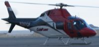 N207CF @ KTUS - CareFlight's N207CF about to lift off - by Ehud Gavron