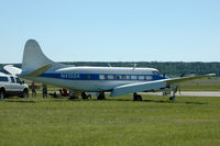 N415SA @ ESOW - Enjoying the sun and air show at Västerås Hässlö airport, Sweden. This aircraft is actually converted into a Riley Turbo Skyliner.