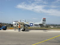 N531KG @ CMA - 1954 North American T-28C TROJAN 'Tough Old Bird', Wright R-1820-86 Cyclone 1,425 Hp, under tow with wing walker - by Doug Robertson