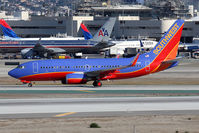 N227WN @ LAX - Southwest Airlines N227WN holding short of RWY 25R after arrival on 25L.