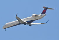 N825SK @ KORD - SkyWest-Delta Express CL600-2D24, N825SK 4R approach KORD - by Mark Kalfas