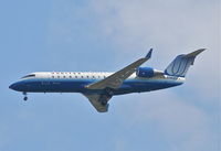N983CA @ KORD - Sky West (United Express) CL-600-2B19, N983CA on the 4R approach KORD - by Mark Kalfas