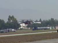 N716HT @ POC - Landing at northside Brackett helitanker parking - by Helicopterfriend