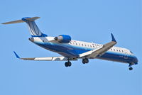 N780SK @ KORD - Sky West/ United Express Bombardier CL-600-2C10, N780SK on final RWY 10 KORD - by Mark Kalfas