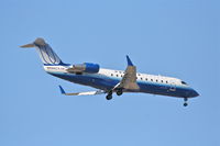 N986UA @ KORD - Sky West/ United Express Bombardier 600-2B19, N986CA on final RWY 10 KORD - by Mark Kalfas