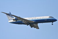 N571ML @ KORD - United Express/Mesa Airlines Canadair CL-600-2B19, N571ML RWY 10 approach KORD - by Mark Kalfas