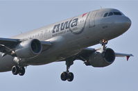 N370NW @ KORD - Northwest Airlines A320-212, N370NW RWY 10 approach KORD - by Mark Kalfas