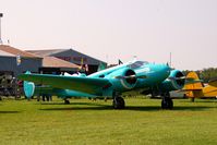 N411J @ IA27 - At the Antique Airplane Association Fly In - by Glenn E. Chatfield