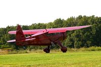 N1227 @ IA27 - At the Antique Airplane Association Fly In.  Was UC-70B 42-49075 - by Glenn E. Chatfield
