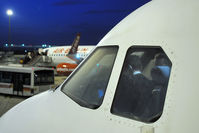 EC-JNA @ LEZL - cockpit crew preparing for departure.